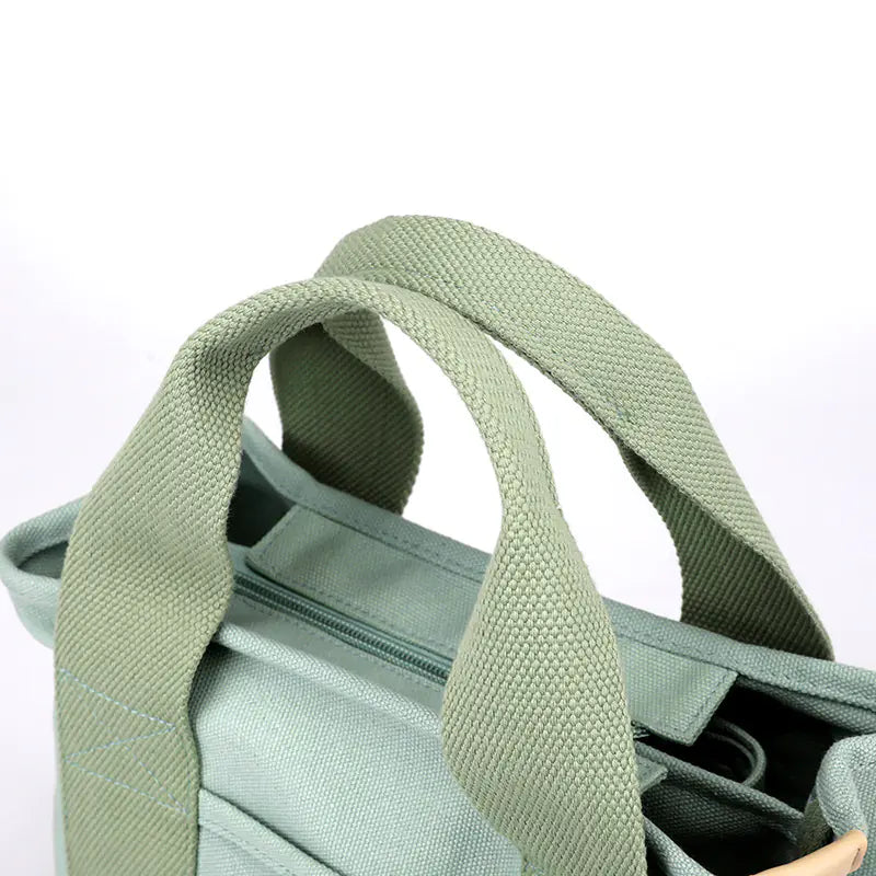 Layered Tote Bag with Zipper and Canvas Design